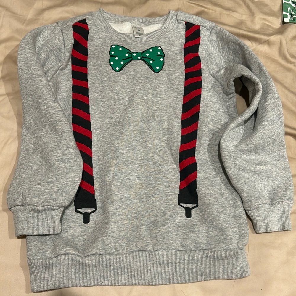 Carter’s new boy sweatshirt without tag never worn.